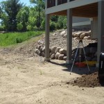 Excavation for paver pad and grading for sod