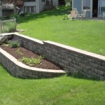 Lower retaining wall with chocolated mulch