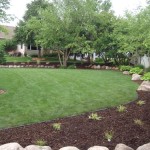 Native Plants,Boulder Outcroppings and Pine Bark Mulch