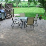 Three weeks after the paver patio completion by Wolf Landscaping