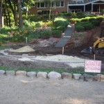 Excavation and retaining wall install Wolf Landscaping