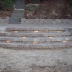 Outdoor staircase and lights by Wolf Landscaping