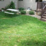 marking off the paver patio area before excavation - Wolf Landscaping