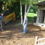 excavating the area for the paver patio - Wolf Landscaping